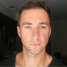 Matt Roeske close-up portrait with a neutral background.