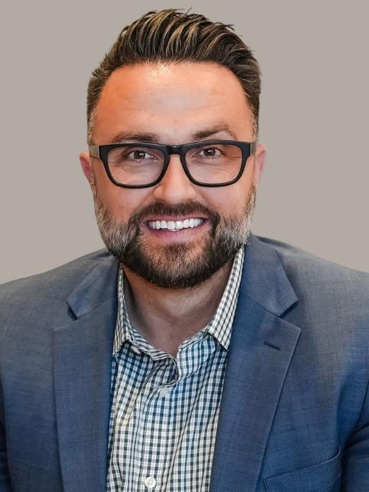 headshot of male with glasses, Lucas Mack
