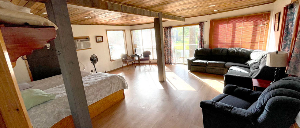 living area with bed - cabin 6