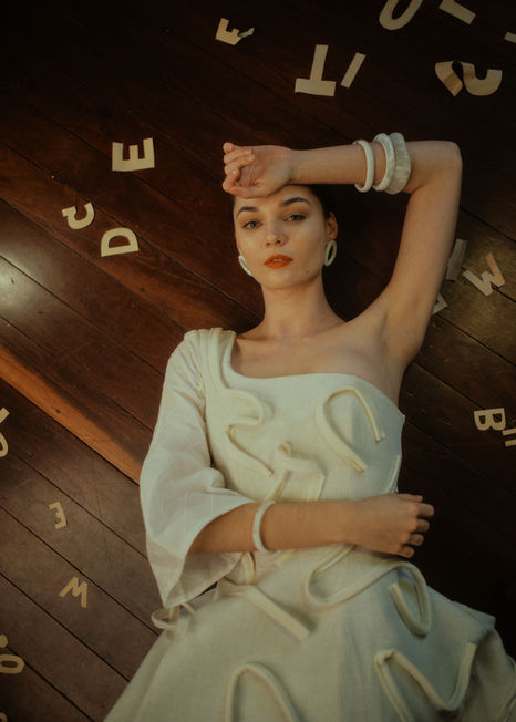 Cotton-Linen asymmetric sculptural dress, with Wool-Cashmere applique, and sheer cotton check underlayer, paired with timber and leather sandals.