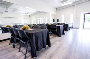 corporate event photo in CASA Denver with tables and chairs setup