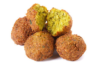 whole and half falafel isolated on a whi