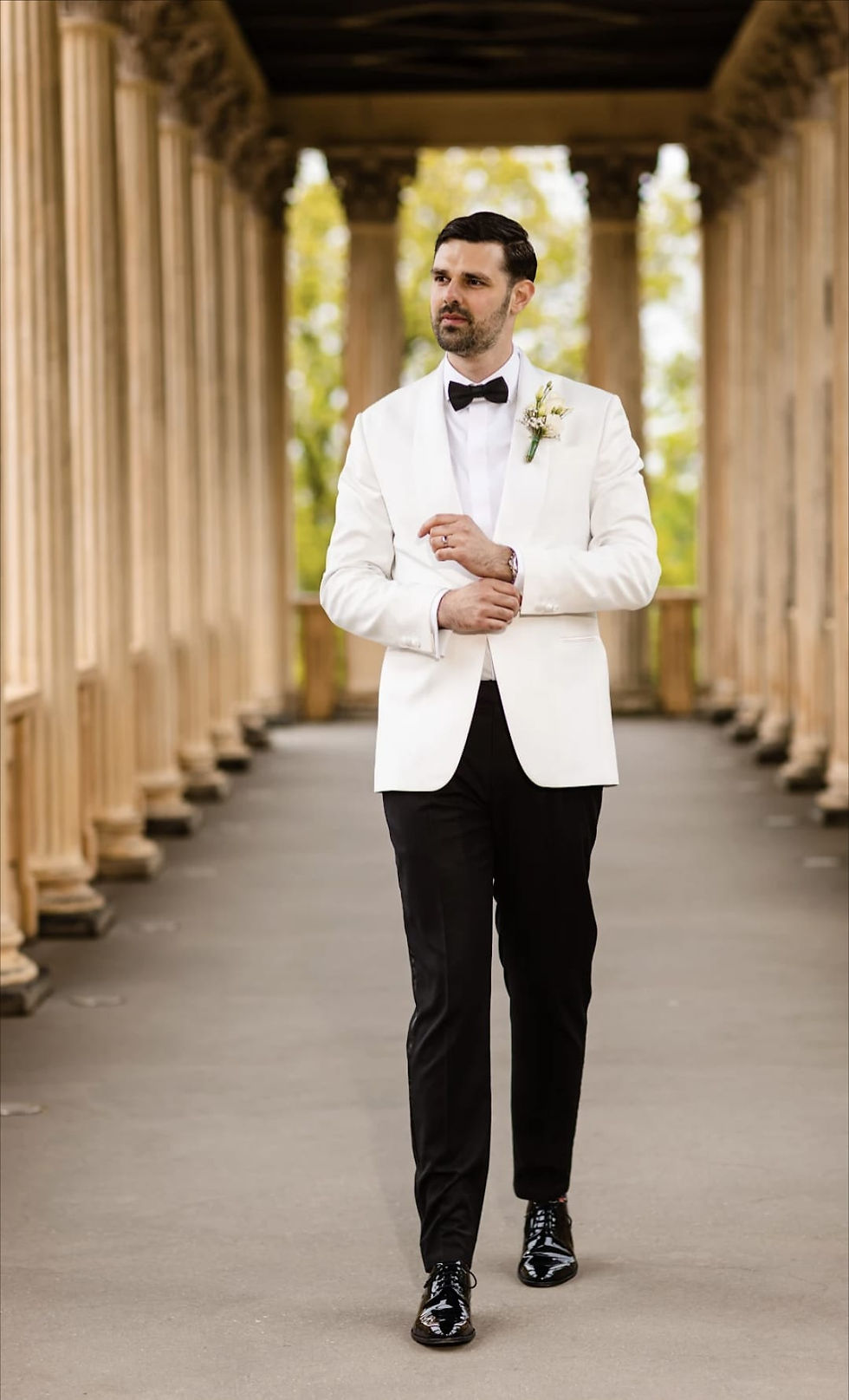 Class white tuxedo jacket and trousers