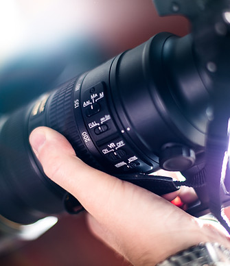 Hand Holding a Camera