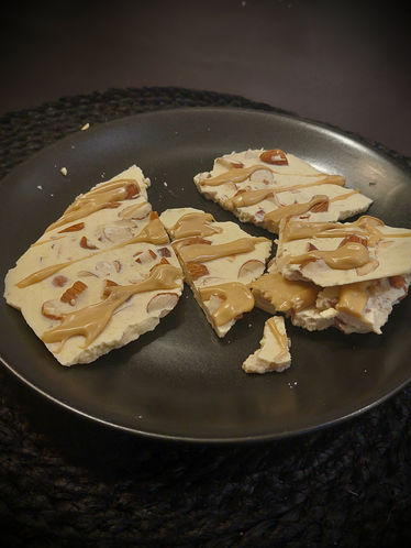 Homemade white maple chocolate with almonds 
