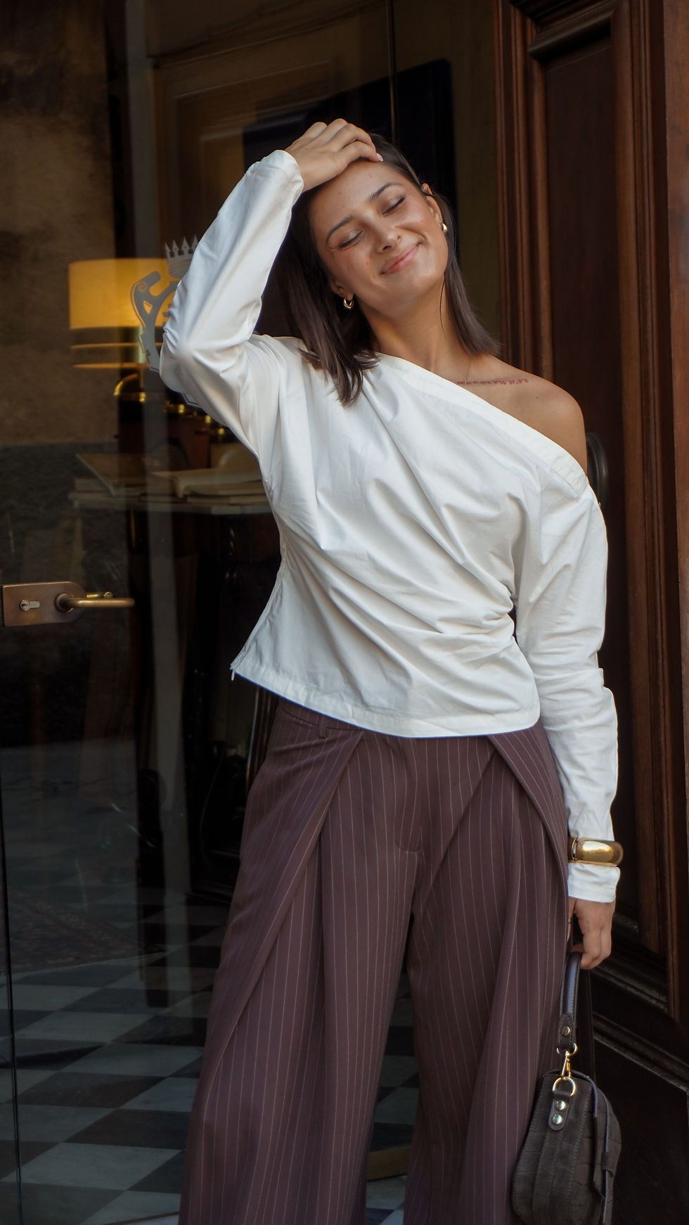 Blusa monospalla drappeggiata bianca