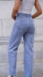 Jeans blu a gamba larga in denim blu vita alta borchie