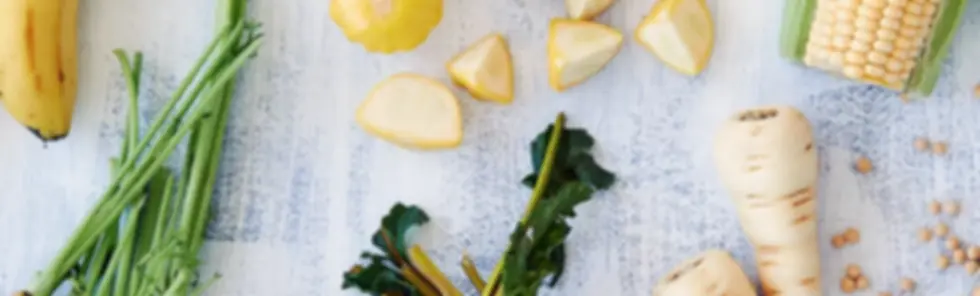 Healthy assortment of yellow foods.webp