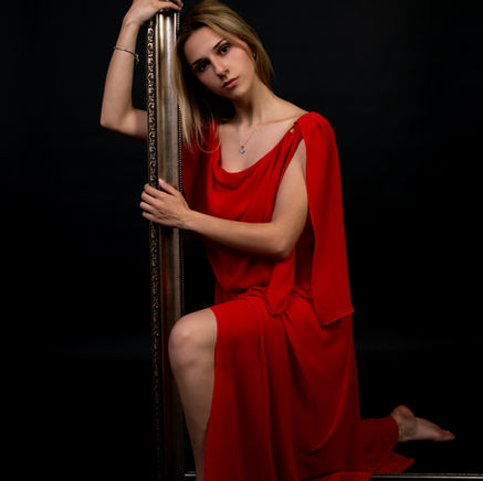 Woman in Red. The Silent Story of a Frame