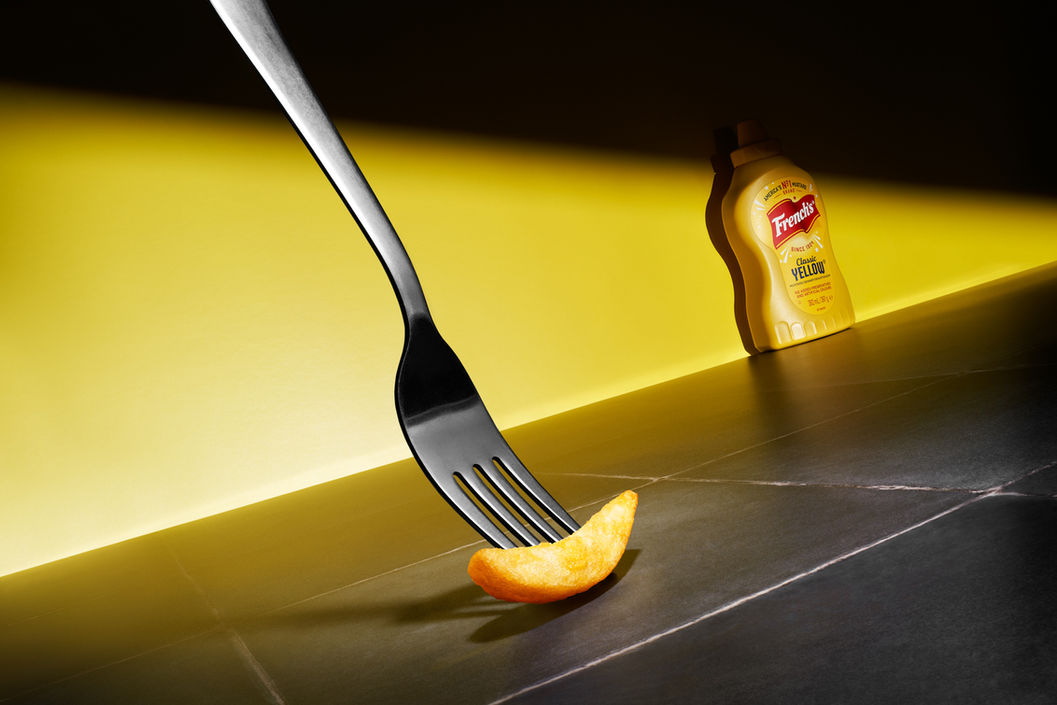 Food photography of Chips and French's Mustard 