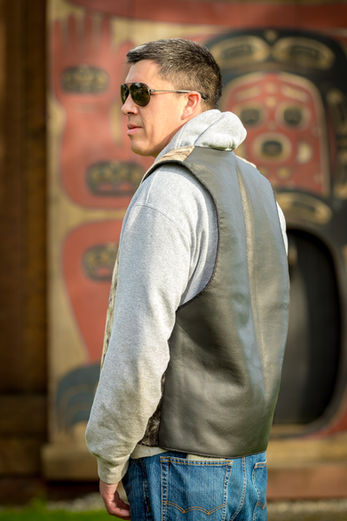 Jeremiah wearing seal and leather backed vest
