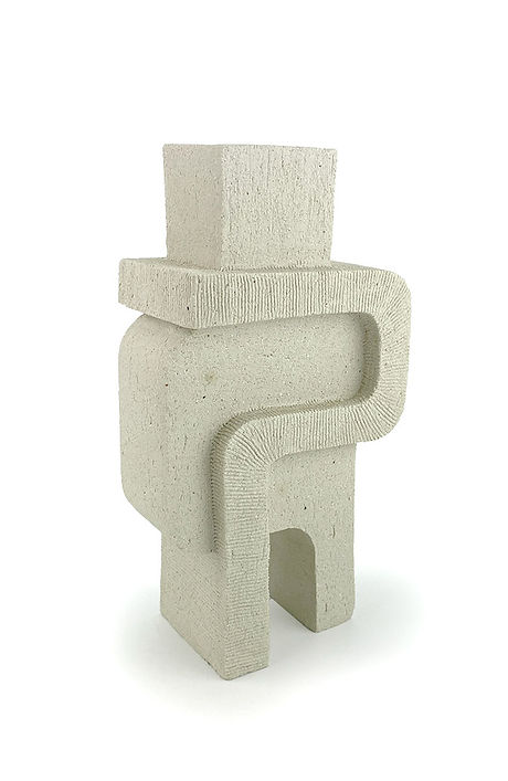 A beige, abstract ceramic sculpture with geometric shapes and textured surfaces, created by ebo ceramics.