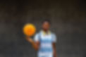 teen-african-american-boy-spinning-basketball-ball-finger-looking-camera-copy-space.jpg