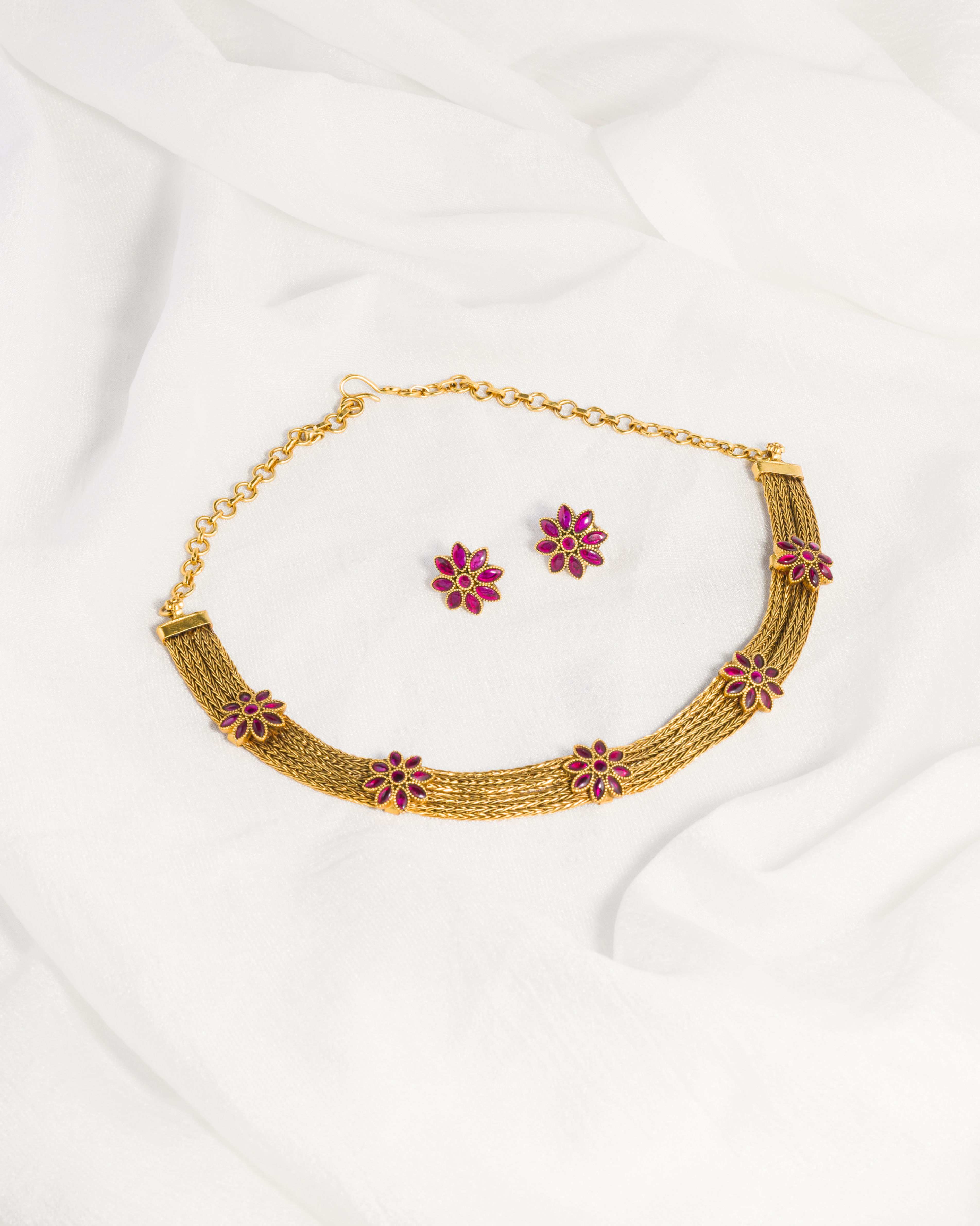 Multi-Strand Gold Necklace Set with Pink Floral Motifs