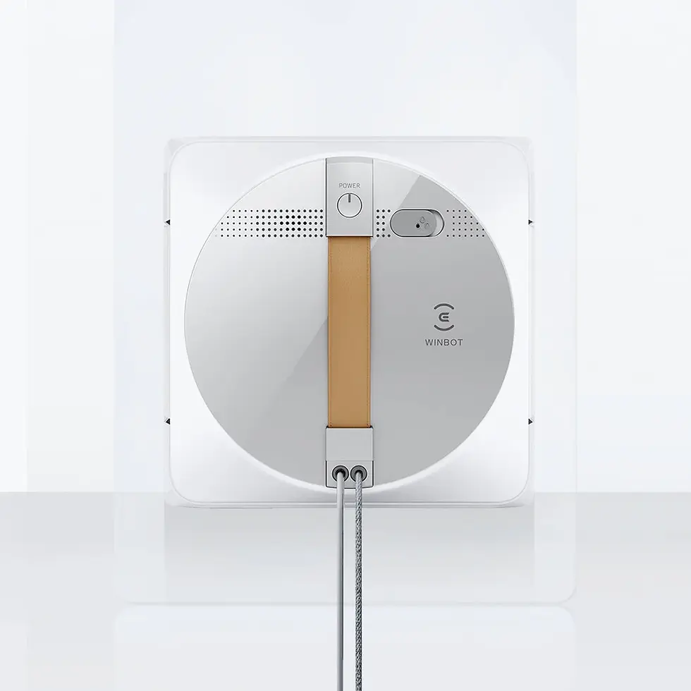 الصورة المصغرة: White robotic window cleaner with beige strap and logo, cleaning glass surface.