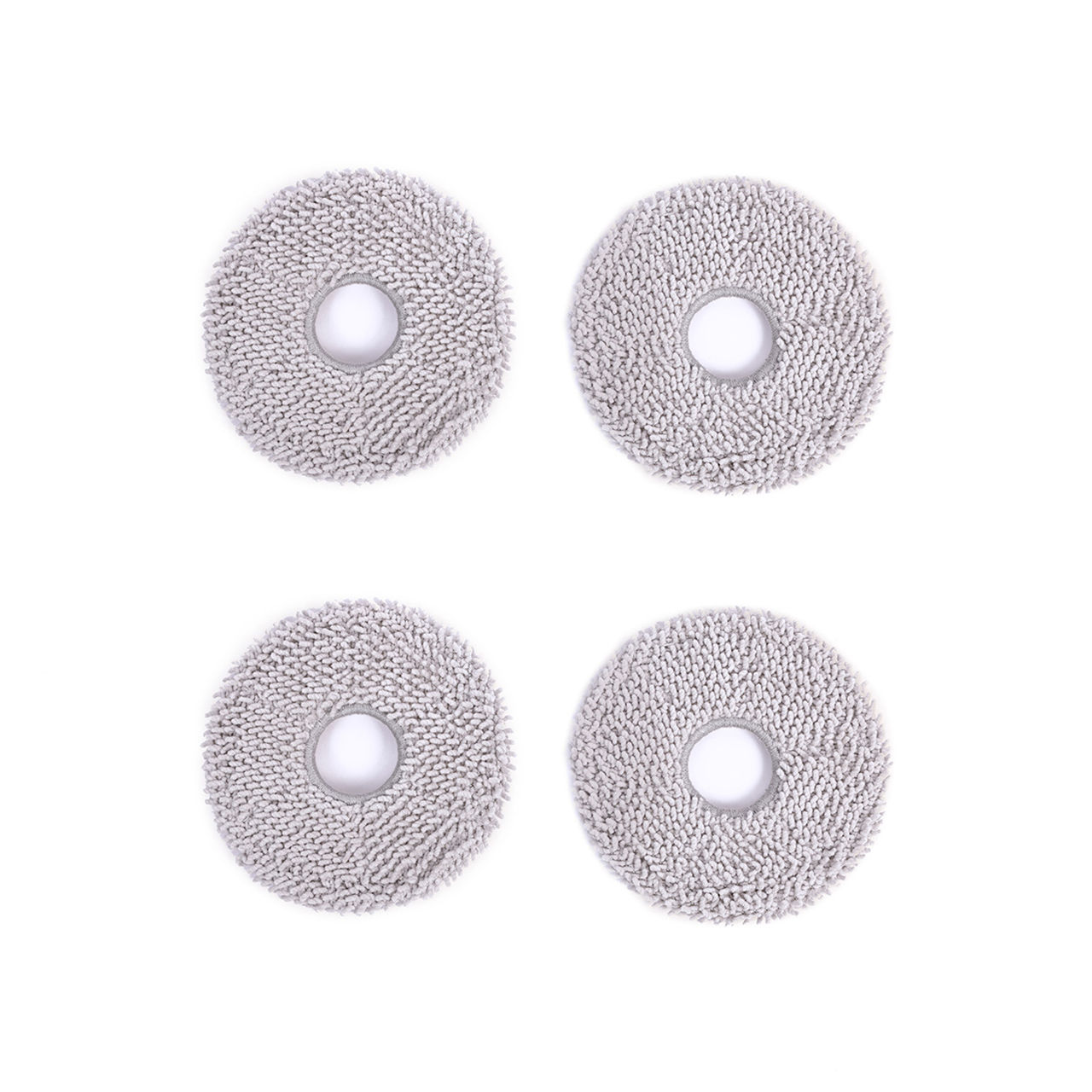 Four gray circular cleaning pads on white background for floor cleaning.