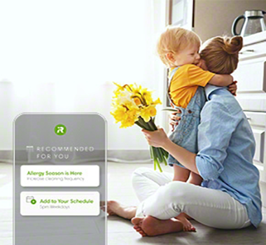 Thumbnail: Mother hugs child holding flowers near robot vacuum, Allergy Season, Recommended