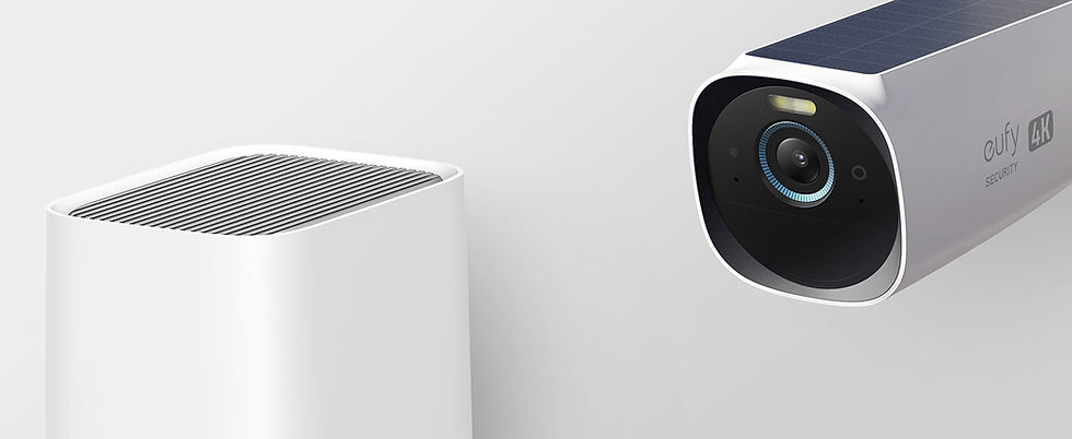 थंबनेल: White camera focused next to a white device on a white wall