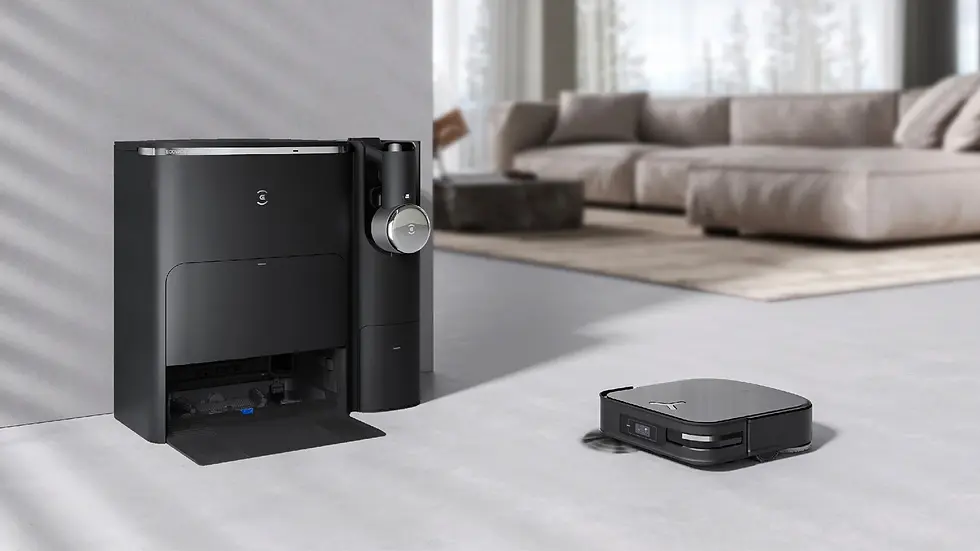 Miniatura: Black Dreame Roboticmower A1 and base station on white floor in living room