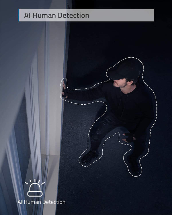 Miniatura: Person in black clothing standing next to building, outlined, and alert light
