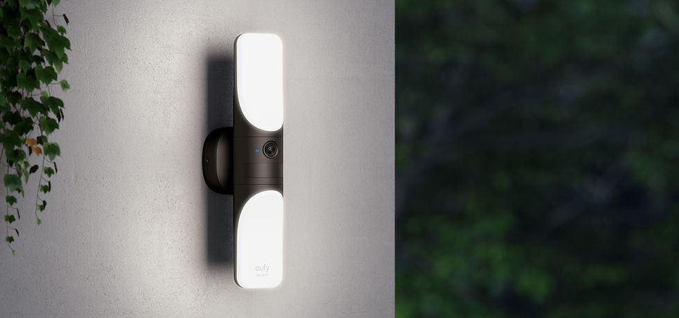 Thumbnail: Black outdoor security light with bright white illumination on painted wall