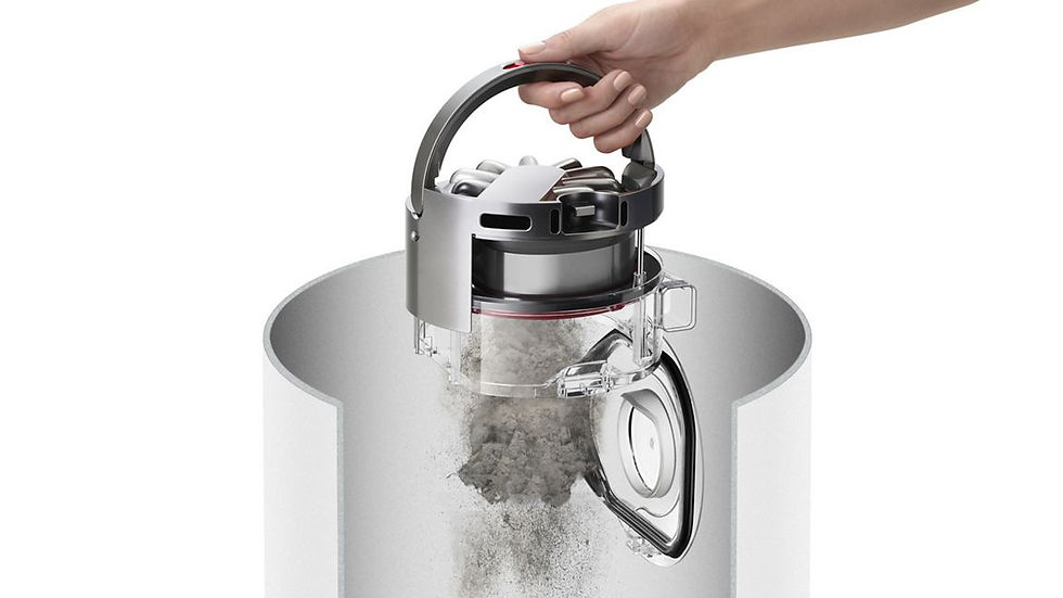Miniatura: Hand opening vacuum canister and emptying dirt into white bin; cleaning process