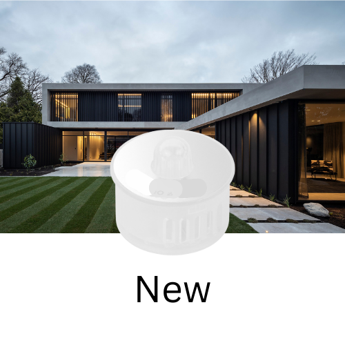 Miniature : White sensor with text "New" in front of modern house background