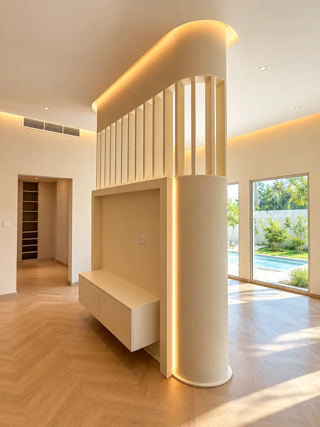 • 
	•  Innovative free-standing custom TV wall unit with a curved privacy partition, integrated floating media console, and built-in architectural LED lighting.