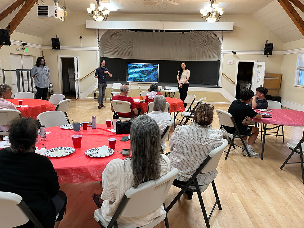 Senior Permit Coordinator Andy Torres (center) outlined more than a dozen large projects the Development Services Department is guiding through Kenmore's permitting process. Planner Reilly Rosbotham (left) and Director of Development Services Smantha Loyuk (right) look on.