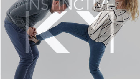 Instinctive Krav Maga Woman kick balls