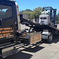 alt="Construction Vehicle - Equipment Transport | Mountain CA | Fixit Towing & Road Service"