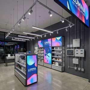 Well-maintained retail branding assets including wall graphics, posters, and in-store visual elements