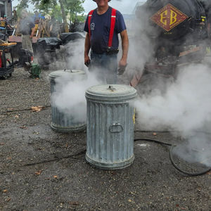 Jeff making steamed corn and potatoes with steam engine 