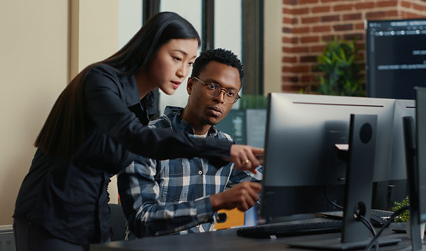 Teacher showing something to a student