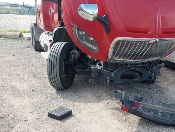 Semi truck repair in progress on-site