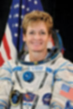 Peggy Whitson, entouré de l'astronaute Thomas Pesquet