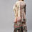 Thumbnail: Women Cream Ethnic Motifs Layered Gotta Patti  Kurta with Sharara & Dupatta