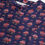 Thumbnail: Navy blue and pink shirt style top