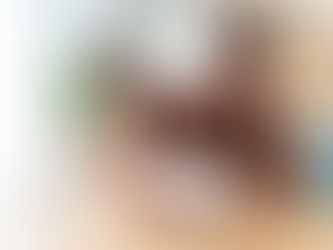 Couple reviewing bills at home due to rent arrears with concerned expressions.