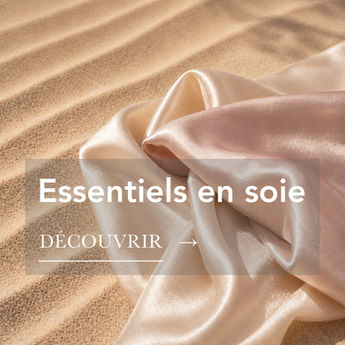 Soie naturelle Neria Hair posée sur du sable pour accéder à la catégorie produits "Essentiels en Soie".