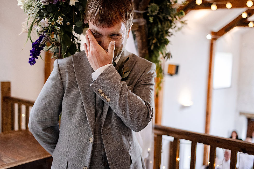 Groom getting emtional as he sees his wife for the first time