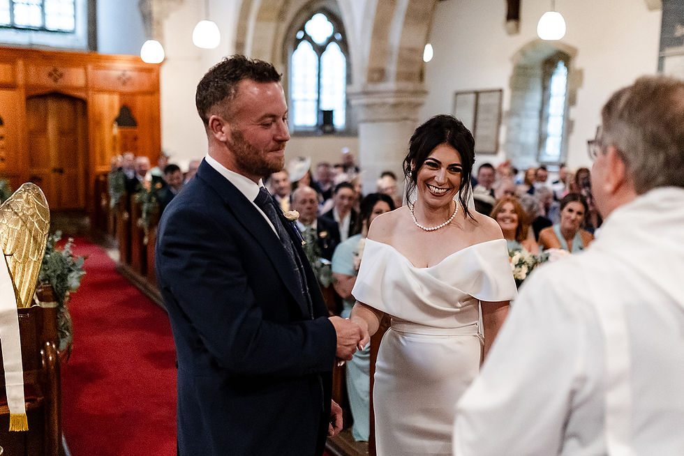 Terrington Church, the couplke are happy to become husband and wife