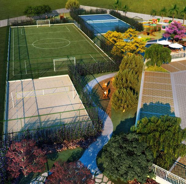 Quadra de areia e campo de futebol
