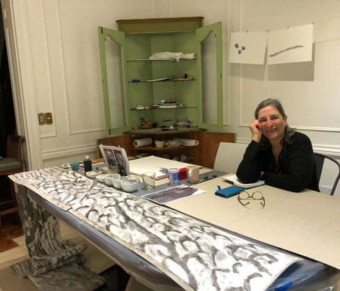 Working on tree trunk ink scrolls in the dining room aka studio