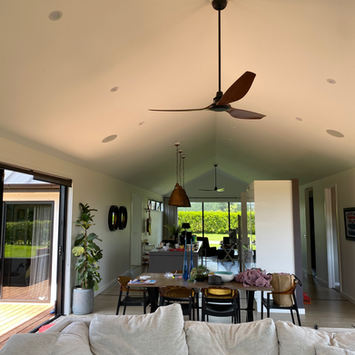 Modern living and dining area with vaulted ceiling