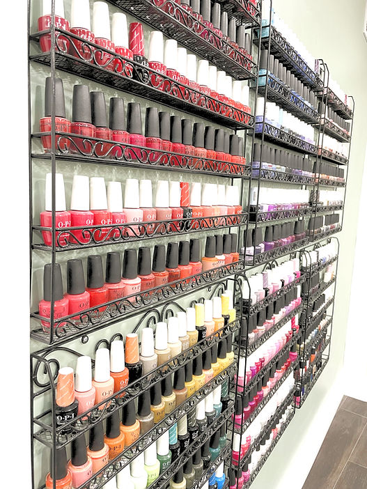 Nail polish bottles on wall