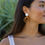Thumbnail: Triple Band Rattan Seashell Earrings