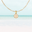 Thumbnail: Gold Mini Mother of Pearl Cross Coin Necklace