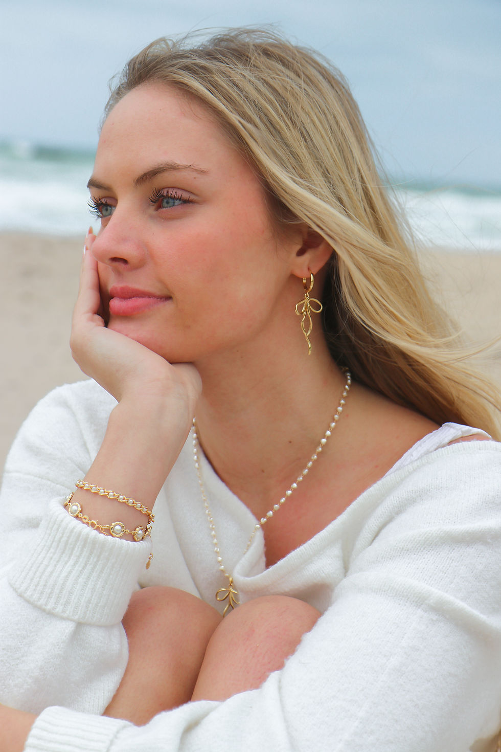 Thumbnail: Gold Long Bow Earrings