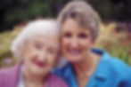 Services_mother-and-daughter_blue-and-purple-shirts_outdoors.jpg